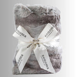 Lavender heat wrap for neck and shoulders, made with soft plush fabric and filled with calming lavender and flaxseed for soothing warmth and relaxation.