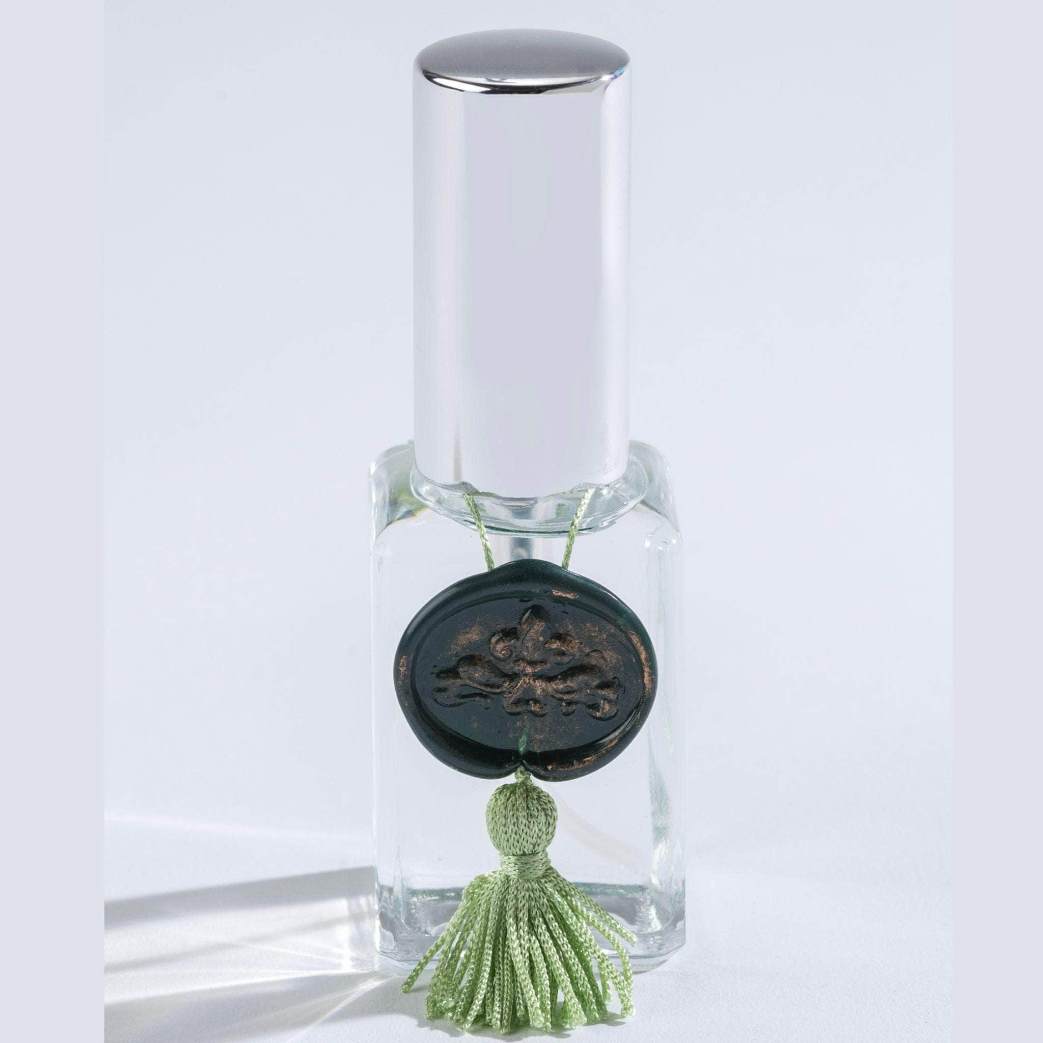 Clear glass spray bottle filled with Sonoma Lavender's Eucalyptus essential oil, featuring a sleek design  and  easu to use.