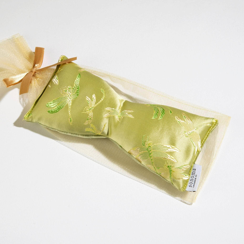 Eucalyptus eye pillow in elegant dragonfly brocade fabric, perfect for soothing relaxation.