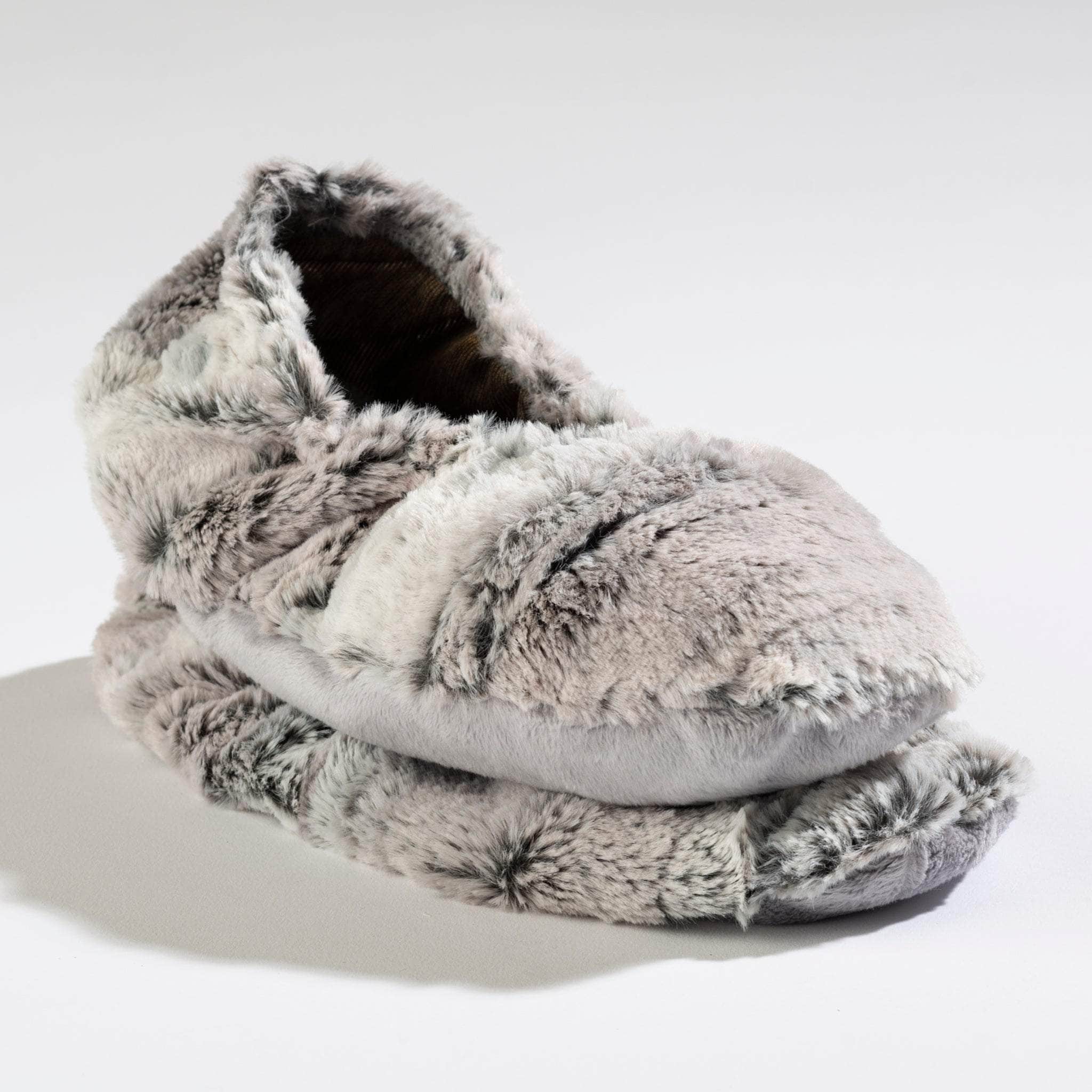 Cozy Eucalyptus Footies in Silver Fox faux fur, offering soothing warmth and a calming aroma for ultimate relaxation.