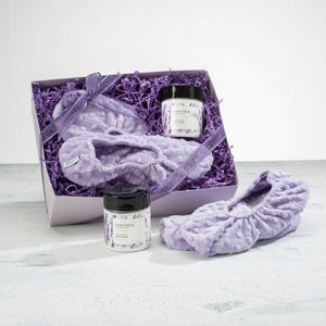 Pamper tired feet with the Lavender Best Foot Forward Gift Set, featuring cozy lavender footies and soothing foot balm for ultimate relaxation.
