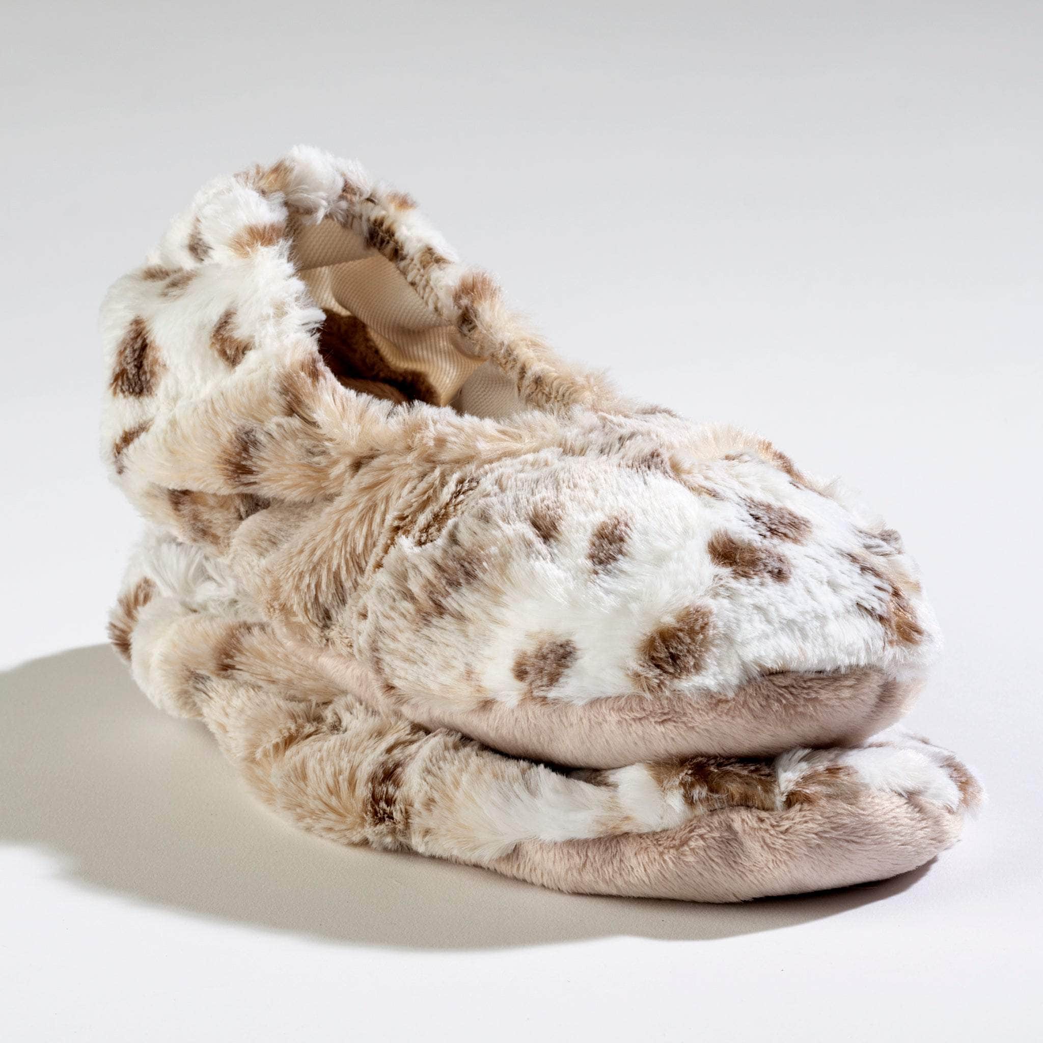 Luxuriously soft Arctic Circle faux fur Lavender Spa Footies, designed to soothe tired feet with the calming benefits of lavender and provide ultimate warmth and comfort.