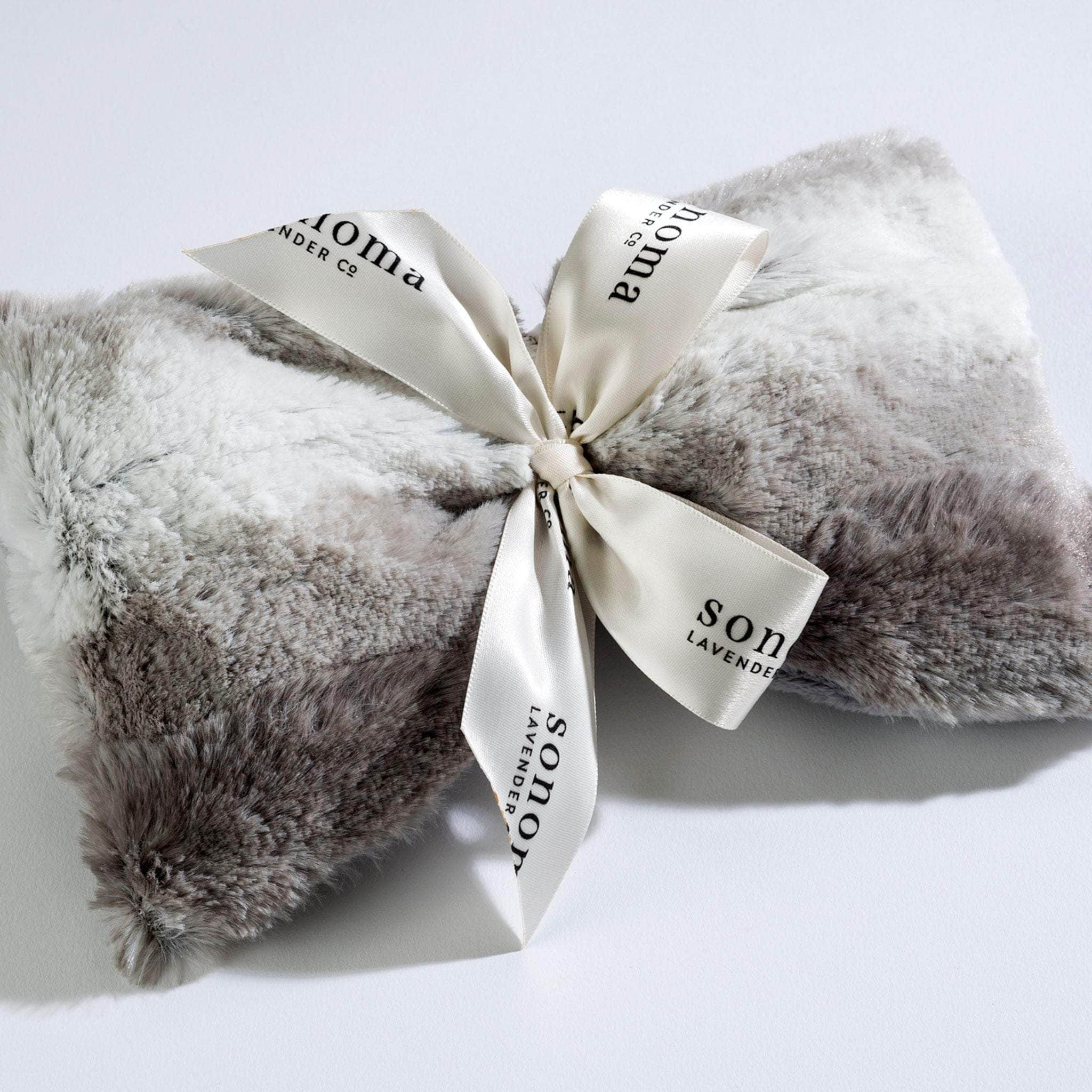 Soothing lavender scent, plush angora fabric, and adjustable design for ultimate relaxation and comfort.